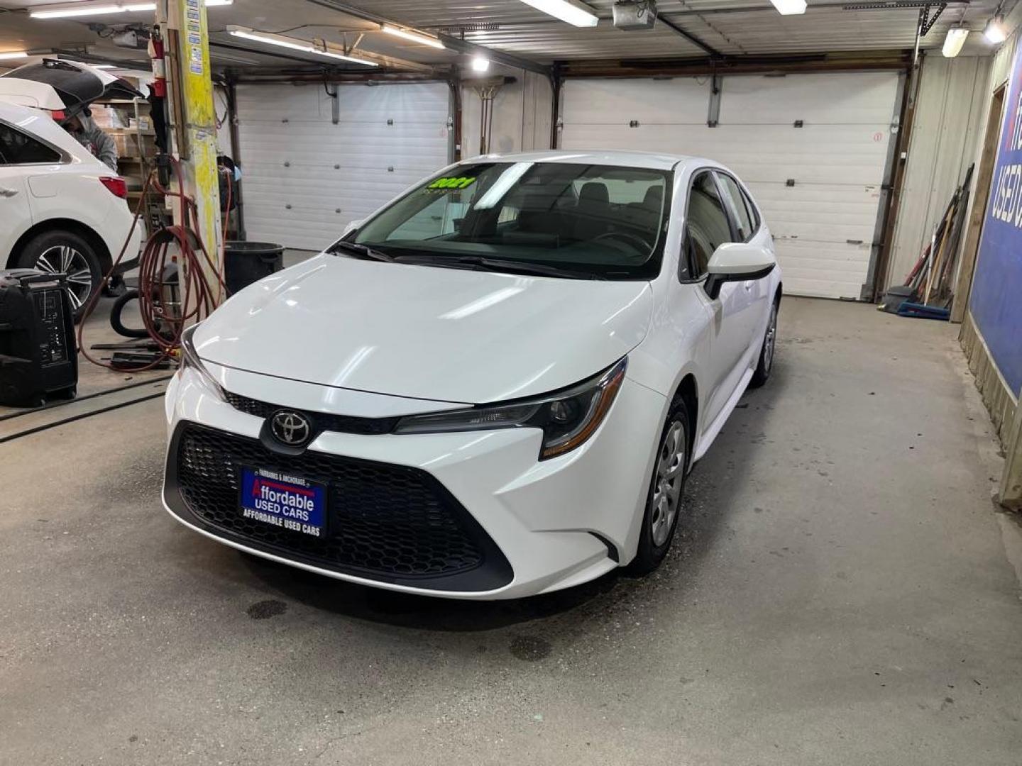 2021 WHITE TOYOTA COROLLA LE LE (5YFEPMAE2MP) with an 1.8L engine, Continuously Variable transmission, located at 2525 S. Cushman, Fairbanks, AK, 99701, (907) 452-5707, 64.824036, -147.712311 - Photo#1