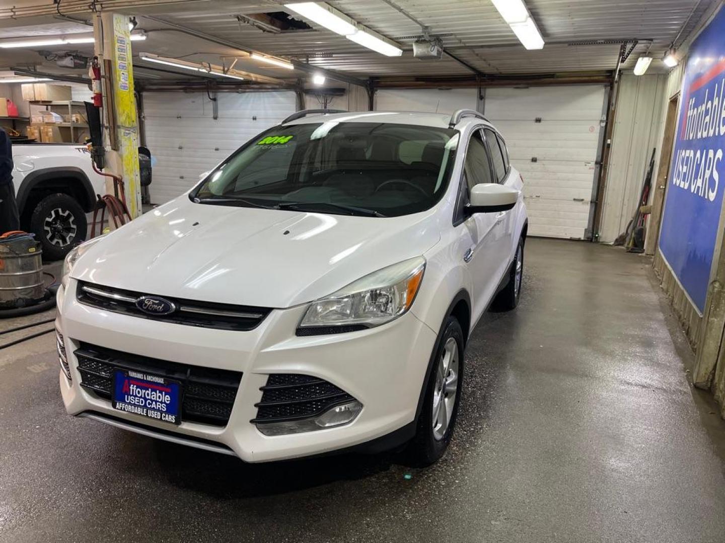 2014 WHITE FORD ESCAPE SE (1FMCU0GX1EU) with an 1.6L engine, Automatic transmission, located at 2525 S. Cushman, Fairbanks, AK, 99701, (907) 452-5707, 64.824036, -147.712311 - Photo#1