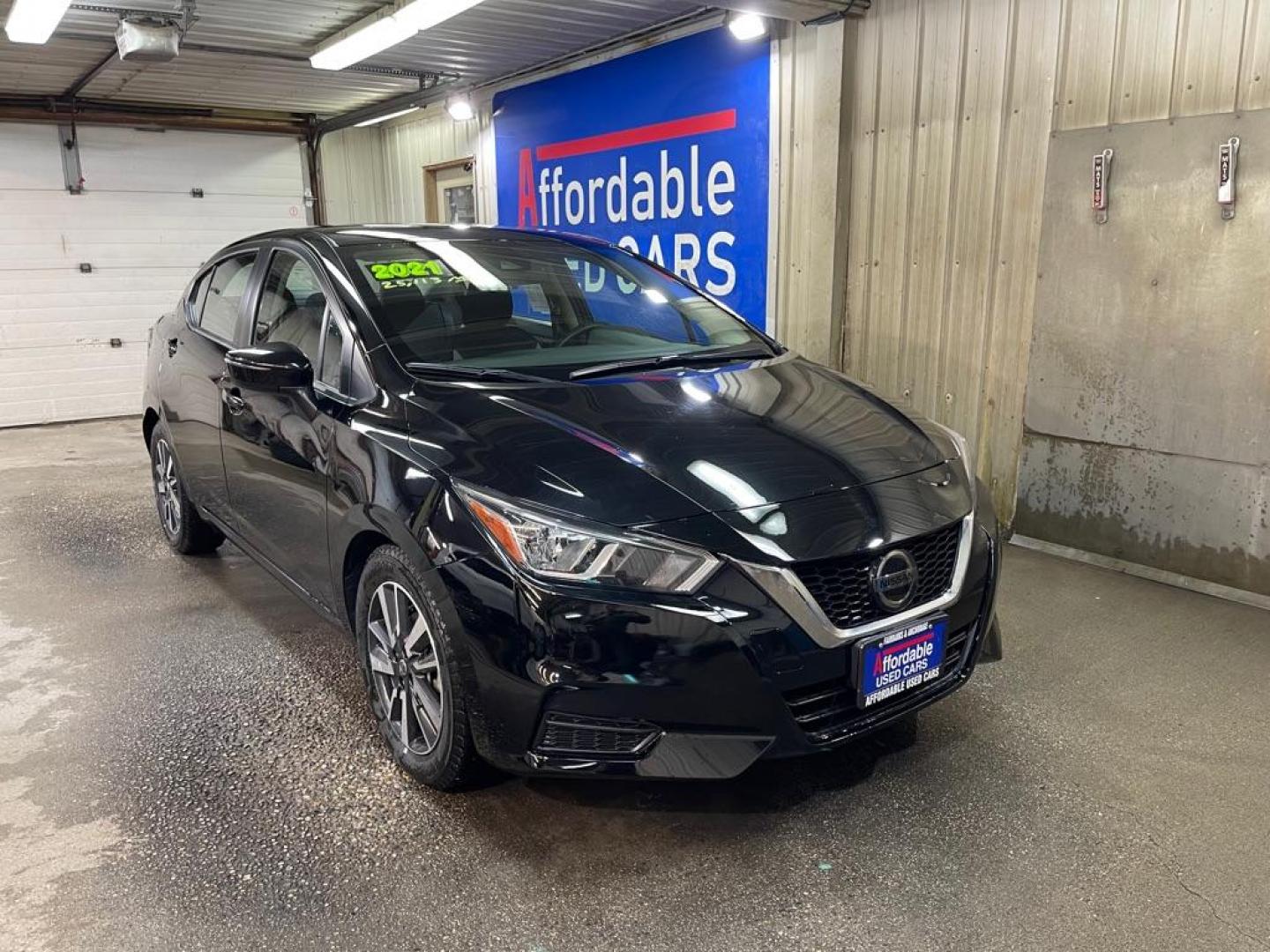 2021 BLACK NISSAN VERSA SV (3N1CN8EV9ML) with an 1.6L engine, Continuously Variable transmission, located at 2525 S. Cushman, Fairbanks, AK, 99701, (907) 452-5707, 64.824036, -147.712311 - Photo#0