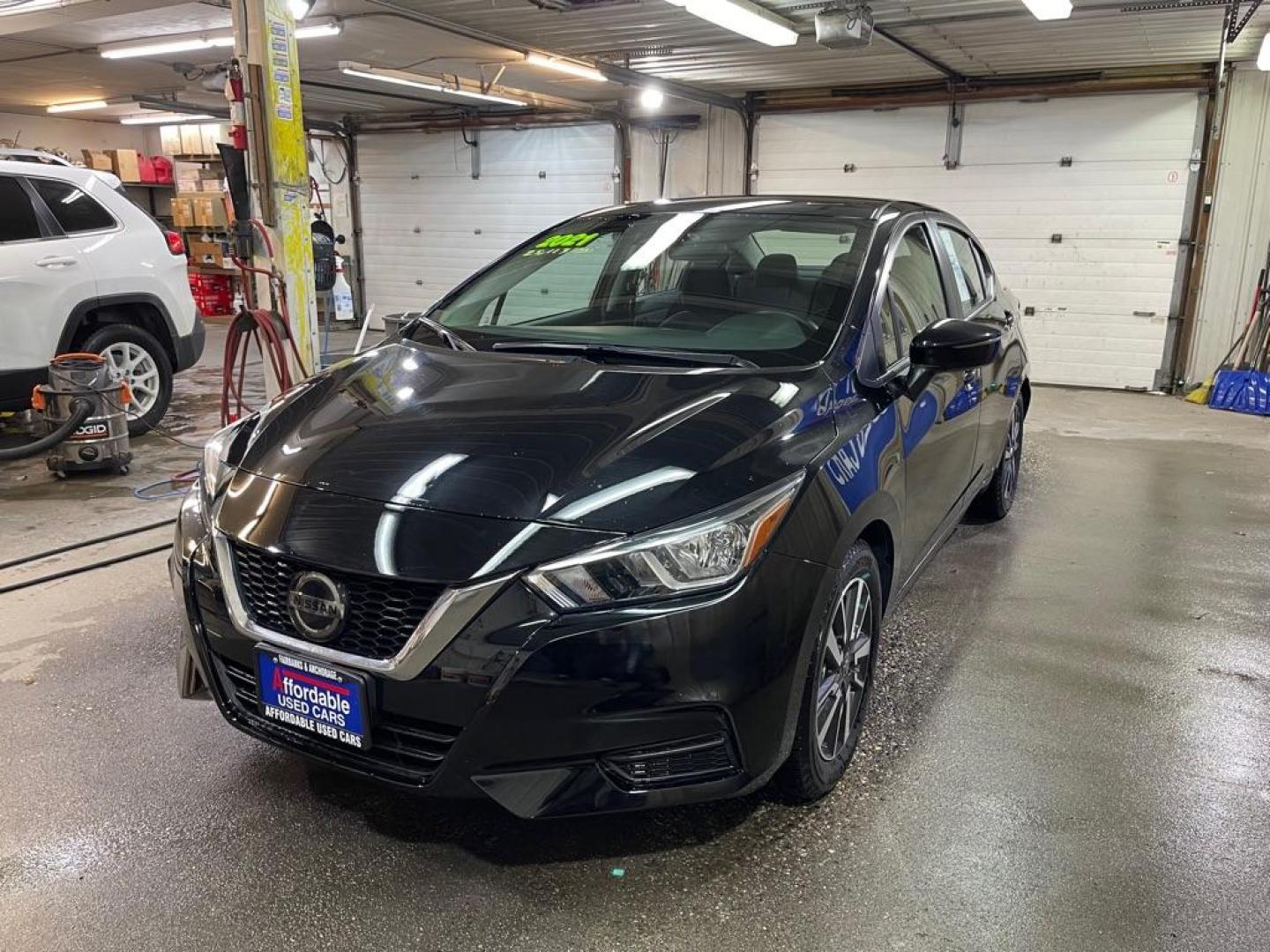 2021 BLACK NISSAN VERSA SV (3N1CN8EV9ML) with an 1.6L engine, Continuously Variable transmission, located at 2525 S. Cushman, Fairbanks, AK, 99701, (907) 452-5707, 64.824036, -147.712311 - Photo#1