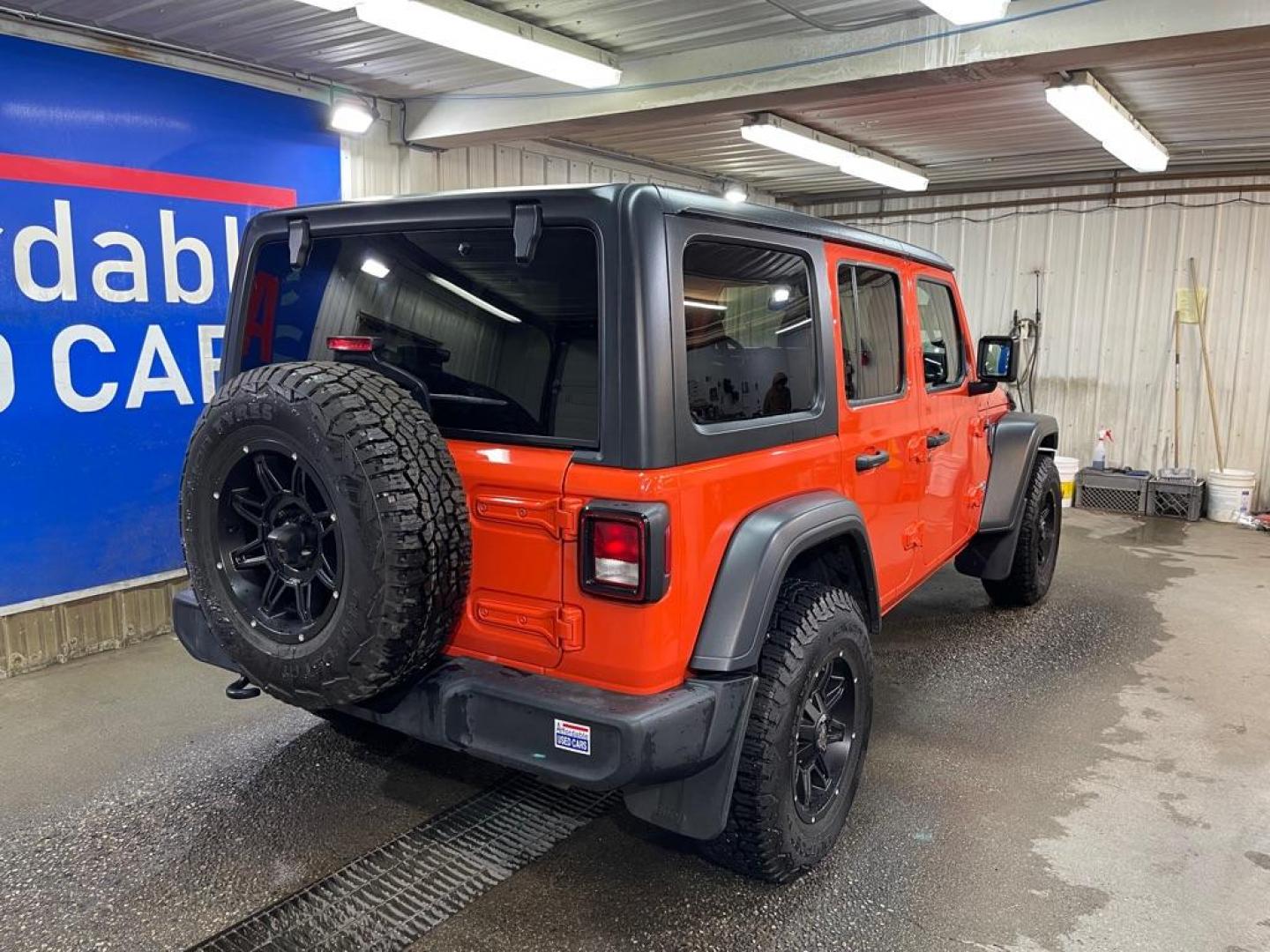 2018 ORANGE JEEP WRANGLER UNLIMI SPORT (1C4HJXDG9JW) with an 3.6L engine, Automatic transmission, located at 2525 S. Cushman, Fairbanks, AK, 99701, (907) 452-5707, 64.824036, -147.712311 - Photo#2