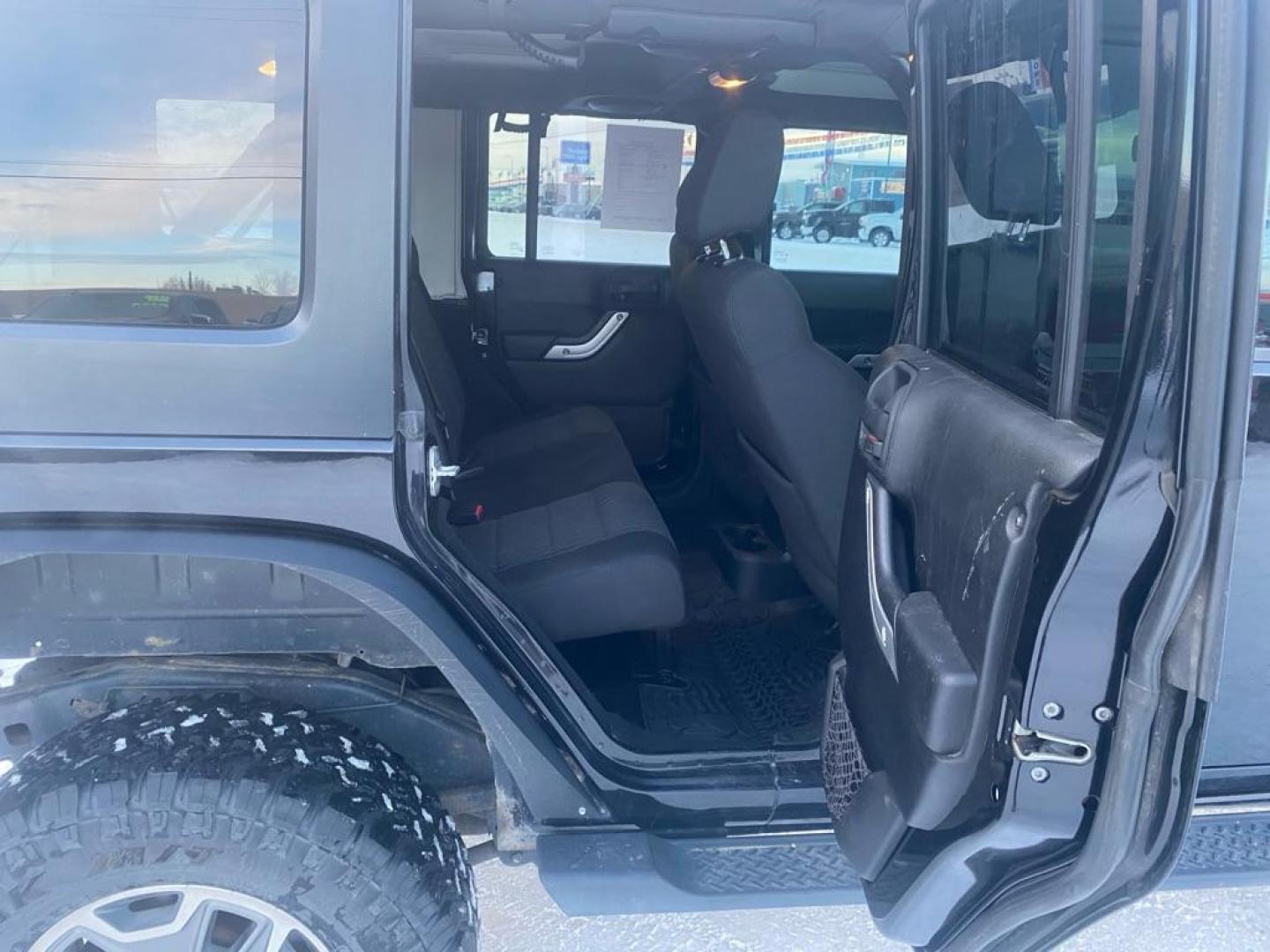 2012 BLACK JEEP WRANGLER UNLIMI SAHARA (1C4BJWEG5CL) with an 3.6L engine, Automatic transmission, located at 2525 S. Cushman, Fairbanks, AK, 99701, (907) 452-5707, 64.824036, -147.712311 - Photo#5