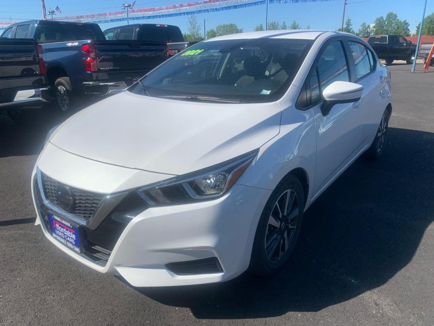 2021 WHITE NISSAN VERSA SV (3N1CN8EV9ML) with an 1.6L engine, Continuously Variable transmission, located at 2525 S. Cushman, Fairbanks, AK, 99701, (907) 452-5707, 64.824036, -147.712311 - Photo#0