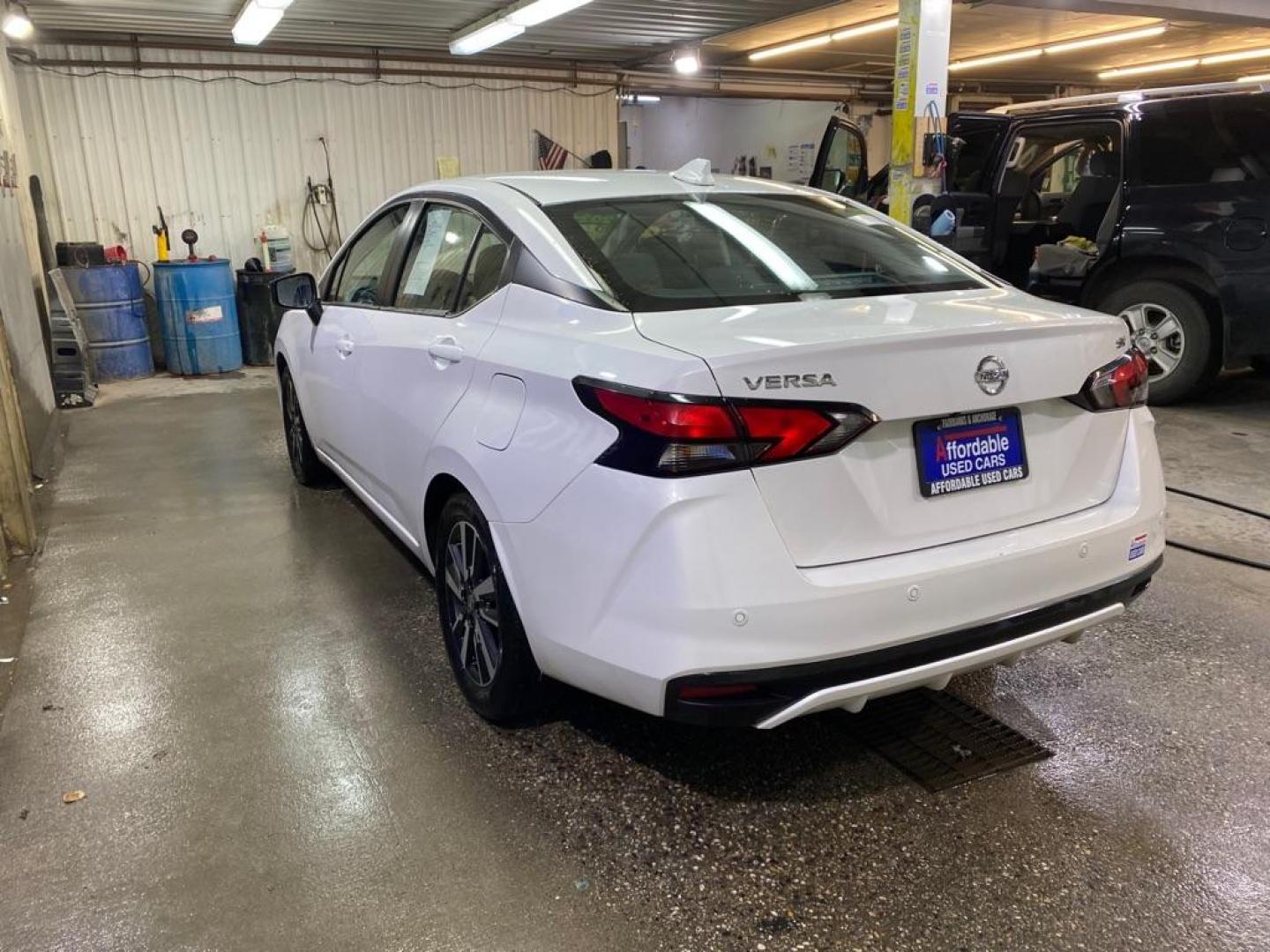 2021 WHITE NISSAN VERSA SV (3N1CN8EV0ML) with an 1.6L engine, Continuously Variable transmission, located at 2525 S. Cushman, Fairbanks, AK, 99701, (907) 452-5707, 64.824036, -147.712311 - Photo#2