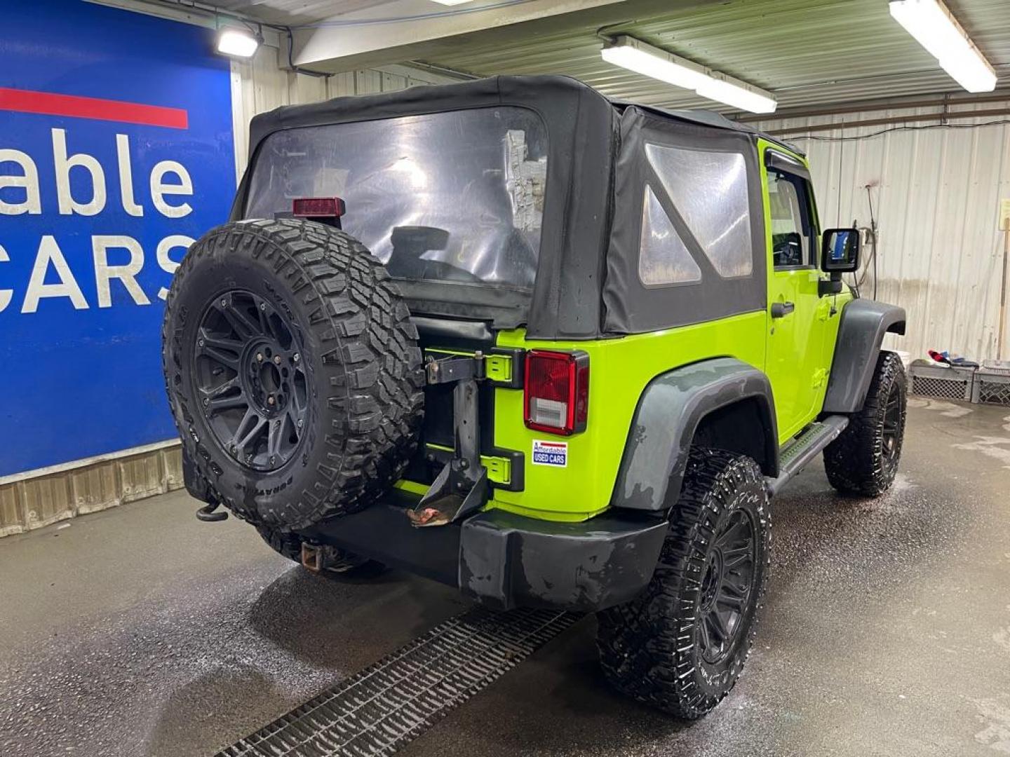 2012 GREEN JEEP WRANGLER SPORT (1C4AJWAG5CL) with an 3.6L engine, 5-Speed Manual transmission, located at 2525 S. Cushman, Fairbanks, AK, 99701, (907) 452-5707, 64.824036, -147.712311 - Photo#2