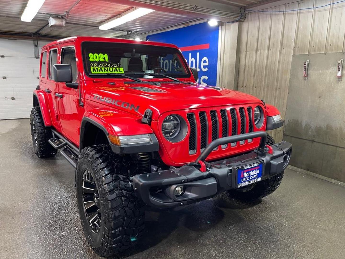 2021 RED JEEP WRANGLER UNLIMI RUBICON (1C4HJXFG5MW) with an 3.6L engine, 8-Speed Manual transmission, located at 2525 S. Cushman, Fairbanks, AK, 99701, (907) 452-5707, 64.824036, -147.712311 - Photo#0