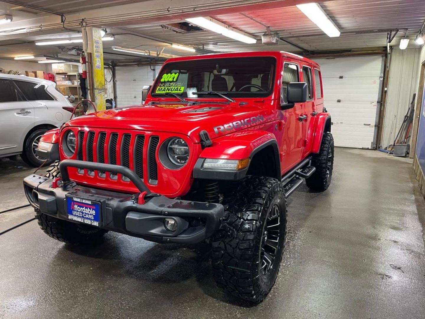 2021 RED JEEP WRANGLER UNLIMI RUBICON (1C4HJXFG5MW) with an 3.6L engine, 8-Speed Manual transmission, located at 2525 S. Cushman, Fairbanks, AK, 99701, (907) 452-5707, 64.824036, -147.712311 - Photo#1