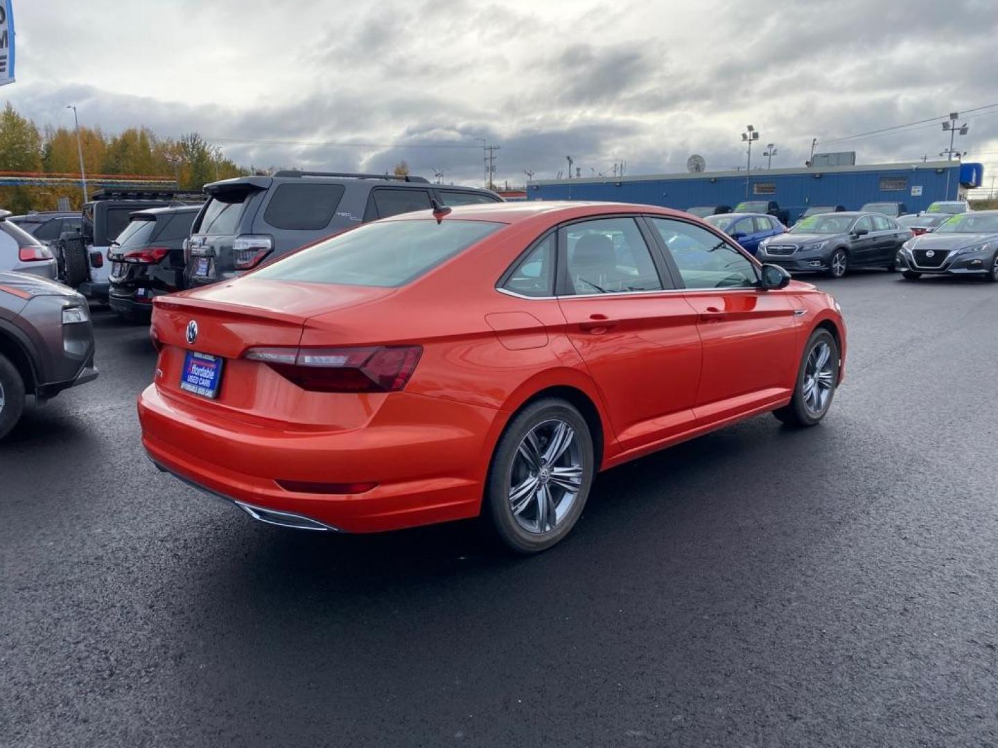 2021 ORANGE VOLKSWAGEN JETTA R-LINE (3VWC57BUXMM) with an 1.4L engine, Automatic transmission, located at 2525 S. Cushman, Fairbanks, AK, 99701, (907) 452-5707, 64.824036, -147.712311 - Photo#2