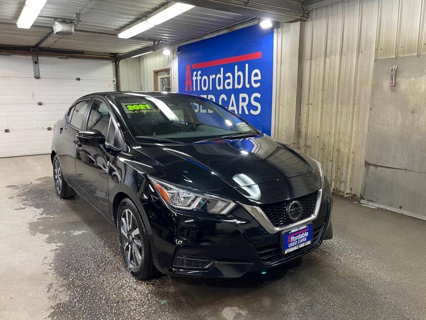 2021 BLACK NISSAN VERSA SV (3N1CN8EV6ML) with an 1.6L engine, Continuously Variable transmission, located at 2525 S. Cushman, Fairbanks, AK, 99701, (907) 452-5707, 64.824036, -147.712311 - Photo#0