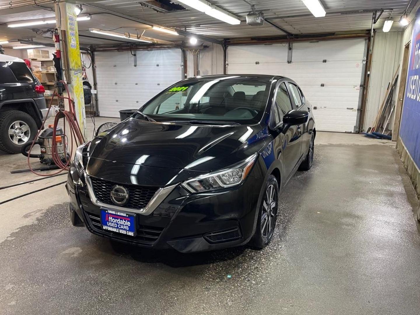 2021 BLACK NISSAN VERSA SV (3N1CN8EV6ML) with an 1.6L engine, Continuously Variable transmission, located at 2525 S. Cushman, Fairbanks, AK, 99701, (907) 452-5707, 64.824036, -147.712311 - Photo#1