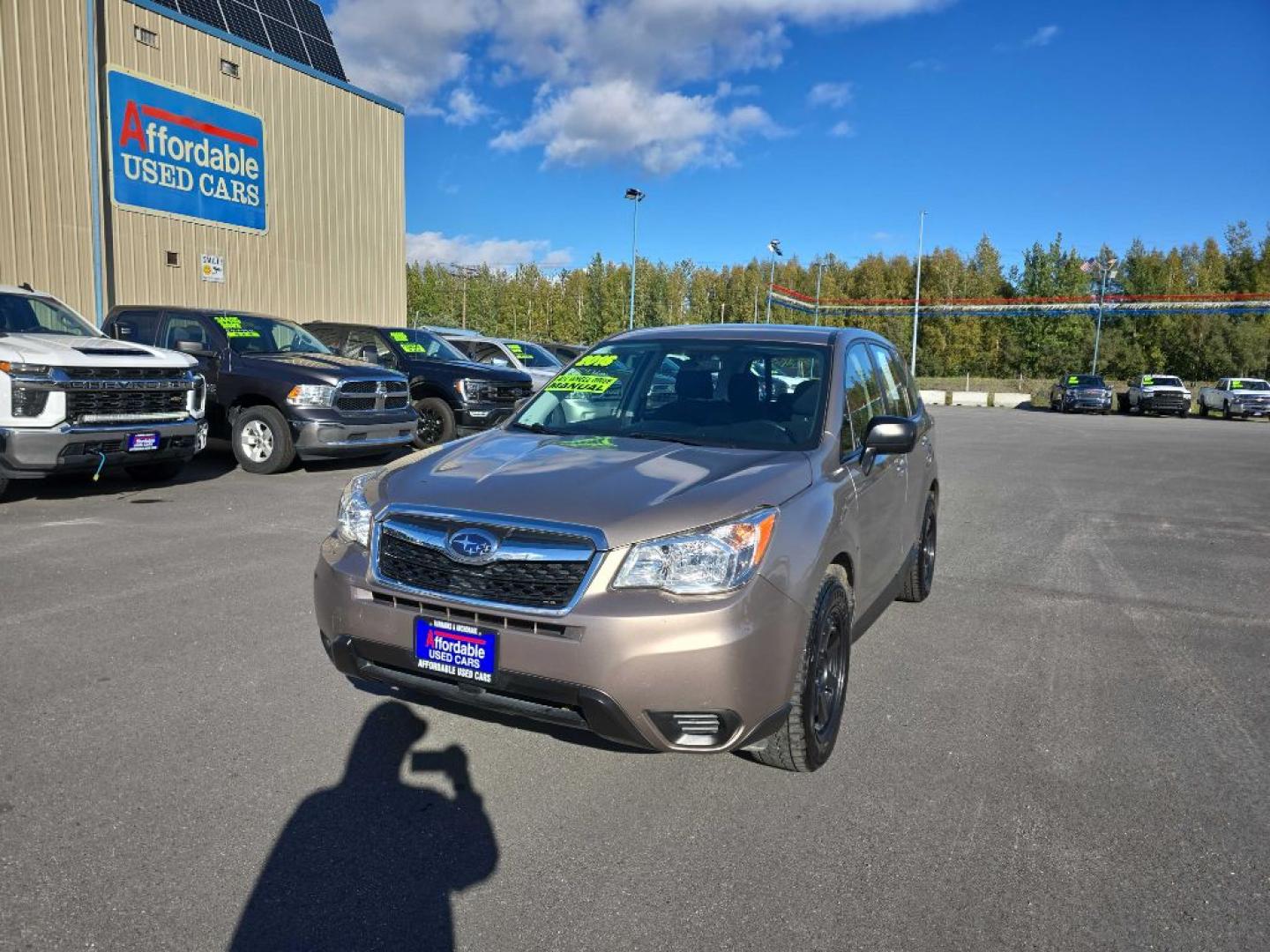 2016 BRONZE SUBARU FORESTER 2.5I (JF2SJAAC8GG) with an 2.5L engine, 6-Speed Manual transmission, located at 2525 S. Cushman, Fairbanks, AK, 99701, (907) 452-5707, 64.824036, -147.712311- Photo#1