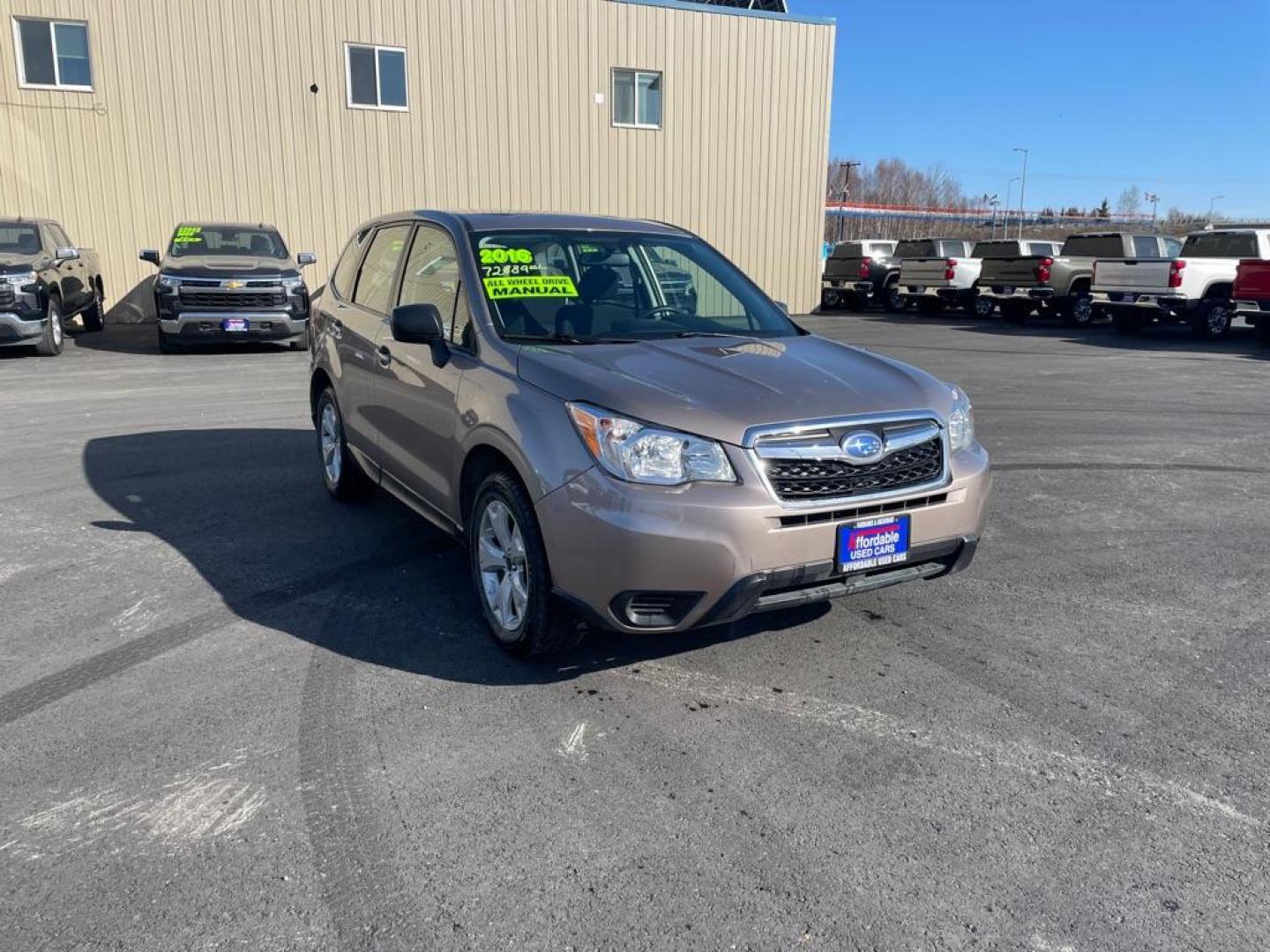 2016 BRONZE SUBARU FORESTER 2.5I (JF2SJAAC8GG) with an 2.5L engine, 6-Speed Manual transmission, located at 2525 S. Cushman, Fairbanks, AK, 99701, (907) 452-5707, 64.824036, -147.712311 - Photo#0