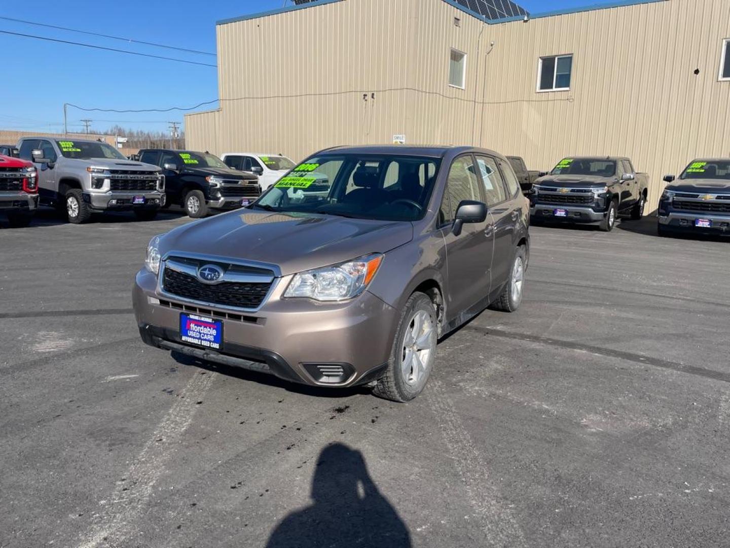 2016 BRONZE SUBARU FORESTER 2.5I (JF2SJAAC8GG) with an 2.5L engine, 6-Speed Manual transmission, located at 2525 S. Cushman, Fairbanks, AK, 99701, (907) 452-5707, 64.824036, -147.712311 - Photo#1