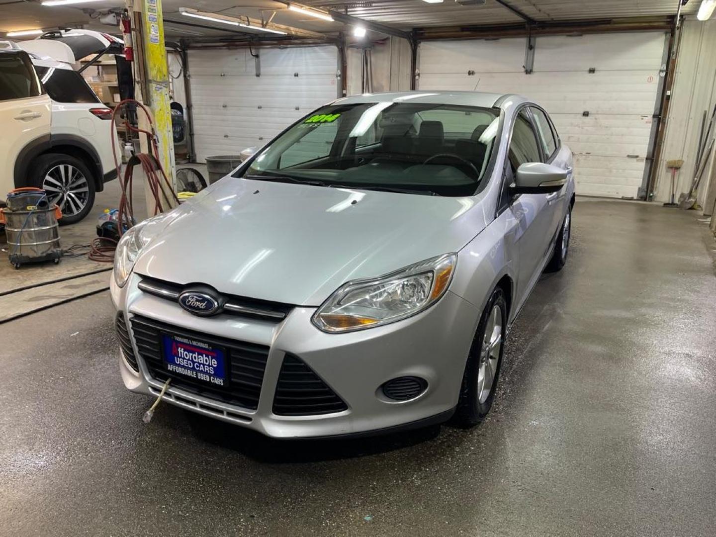 2014 SILVER FORD FOCUS SE (1FADP3F29EL) with an 2.0L engine, Automatic transmission, located at 2525 S. Cushman, Fairbanks, AK, 99701, (907) 452-5707, 64.824036, -147.712311 - Photo#1