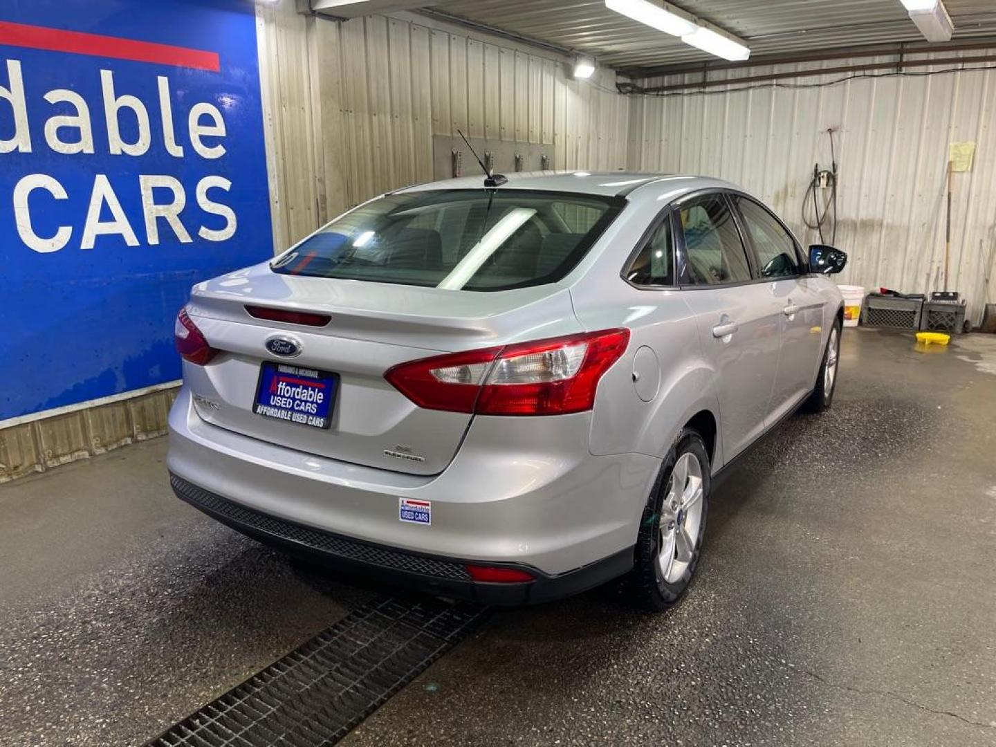 2014 SILVER FORD FOCUS SE (1FADP3F29EL) with an 2.0L engine, Automatic transmission, located at 2525 S. Cushman, Fairbanks, AK, 99701, (907) 452-5707, 64.824036, -147.712311 - Photo#2