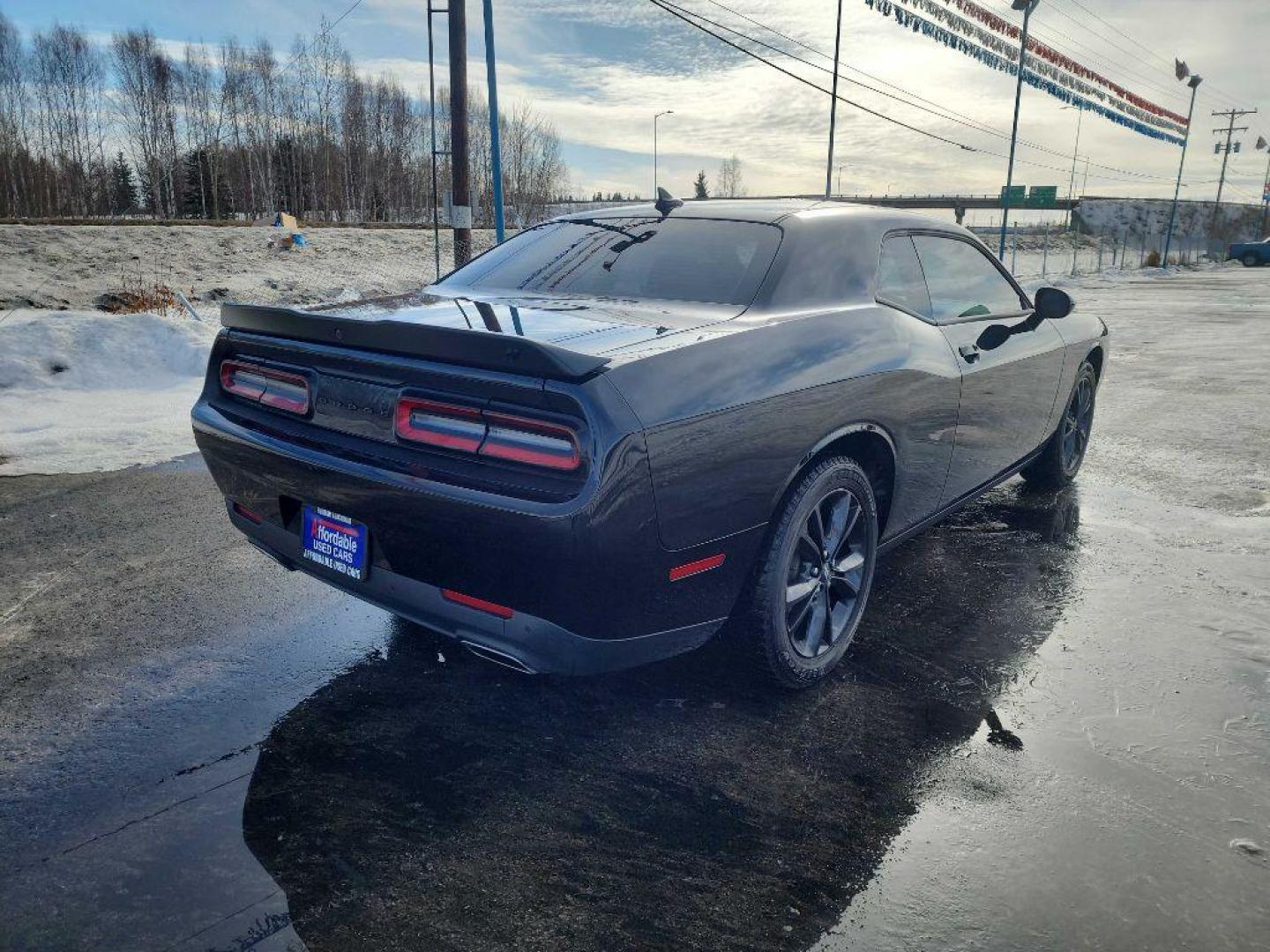 2021 BLACK DODGE CHALLENGER SXT (2C3CDZGG9MH) with an 3.6L engine, Automatic transmission, located at 2525 S. Cushman, Fairbanks, AK, 99701, (907) 452-5707, 64.824036, -147.712311 - Photo#4