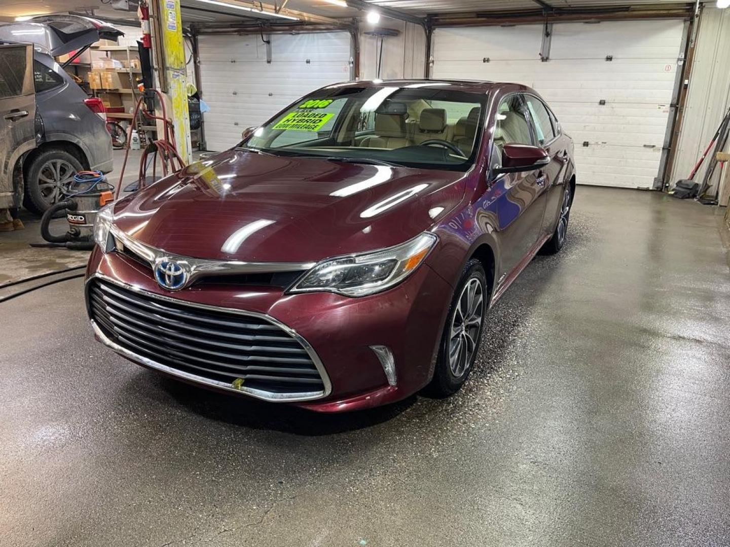 2016 MAROON TOYOTA AVALON HYBRID (4T1BD1EB1GU) with an 2.5L engine, Automatic transmission, located at 2525 S. Cushman, Fairbanks, AK, 99701, (907) 452-5707, 64.824036, -147.712311 - Photo#1