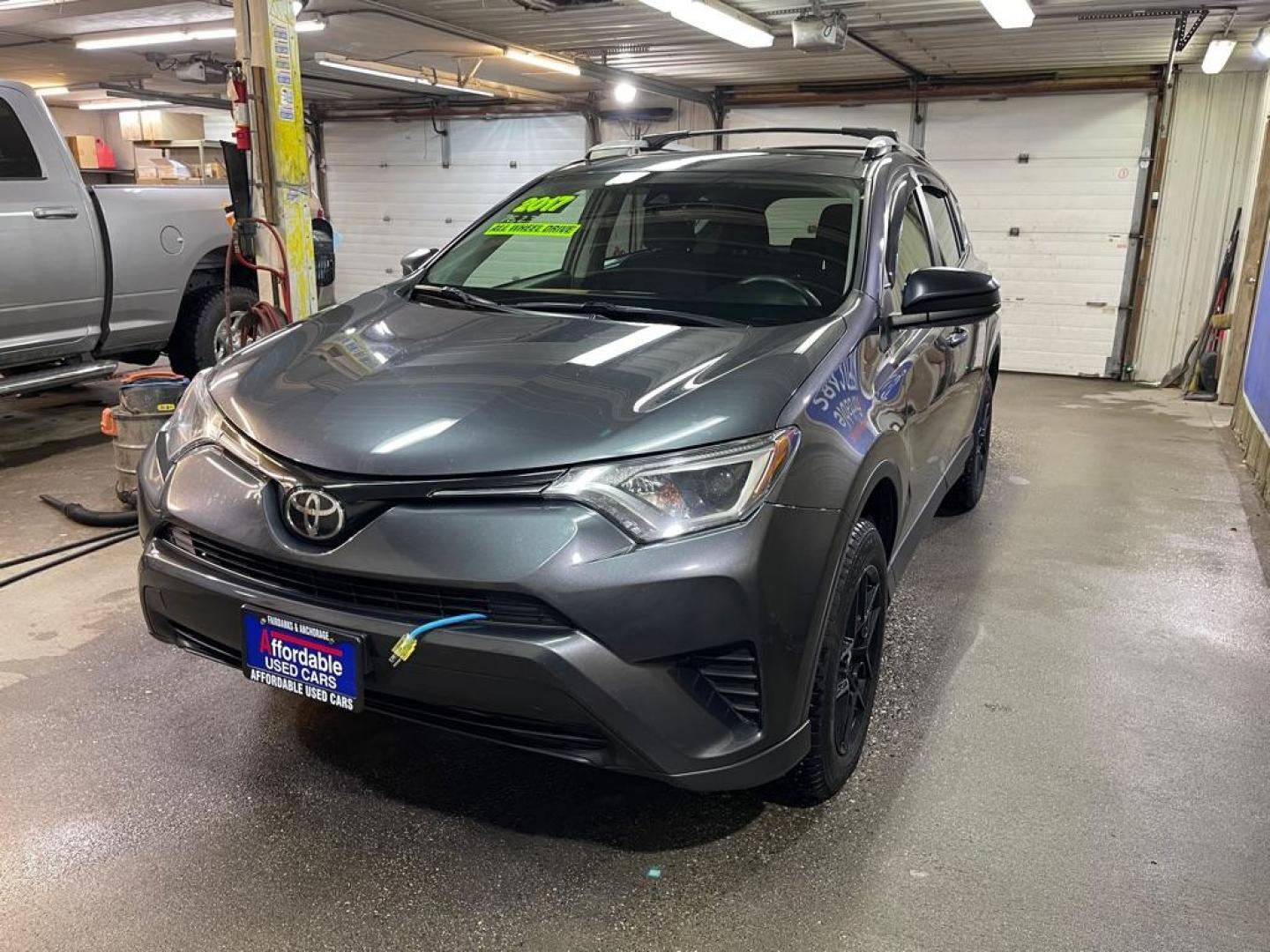 2017 BLACK TOYOTA RAV4 LE (JTMBFREV3HJ) with an 2.5L engine, Automatic transmission, located at 2525 S. Cushman, Fairbanks, AK, 99701, (907) 452-5707, 64.824036, -147.712311 - Photo#1