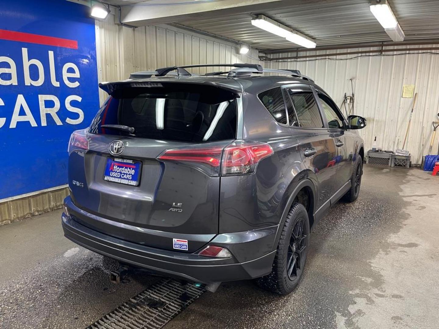 2017 BLACK TOYOTA RAV4 LE (JTMBFREV3HJ) with an 2.5L engine, Automatic transmission, located at 2525 S. Cushman, Fairbanks, AK, 99701, (907) 452-5707, 64.824036, -147.712311 - Photo#2