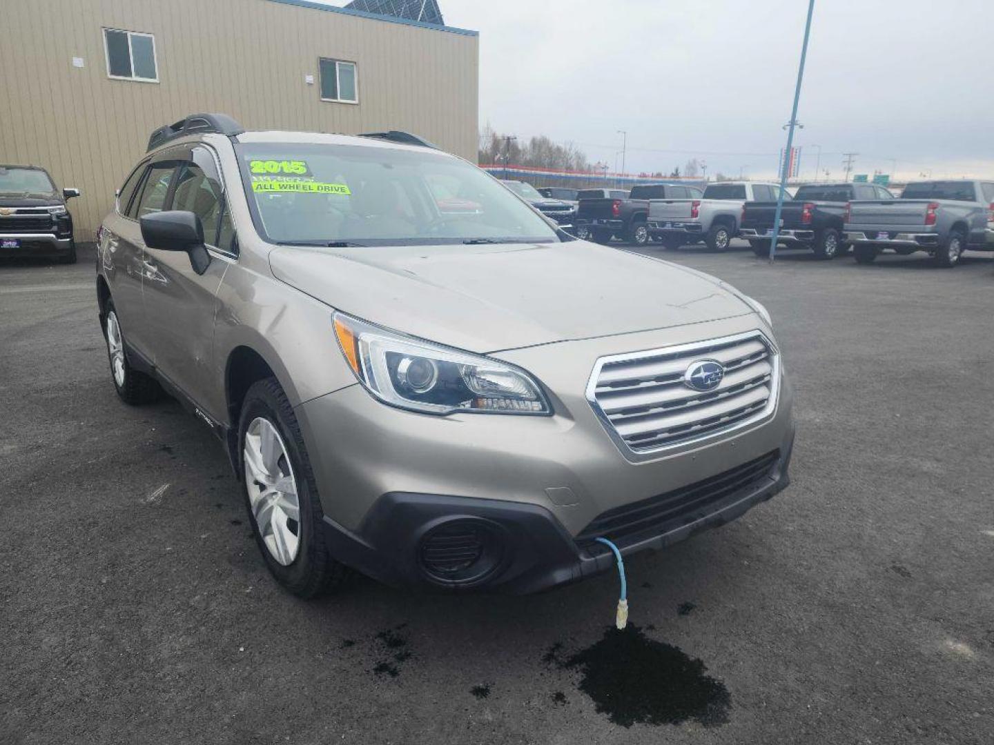 2015 GOLD SUBARU OUTBACK 2.5I (4S4BSBAC2F3) with an 2.5L engine, Continuously Variable transmission, located at 2525 S. Cushman, Fairbanks, AK, 99701, (907) 452-5707, 64.824036, -147.712311 - Photo#0