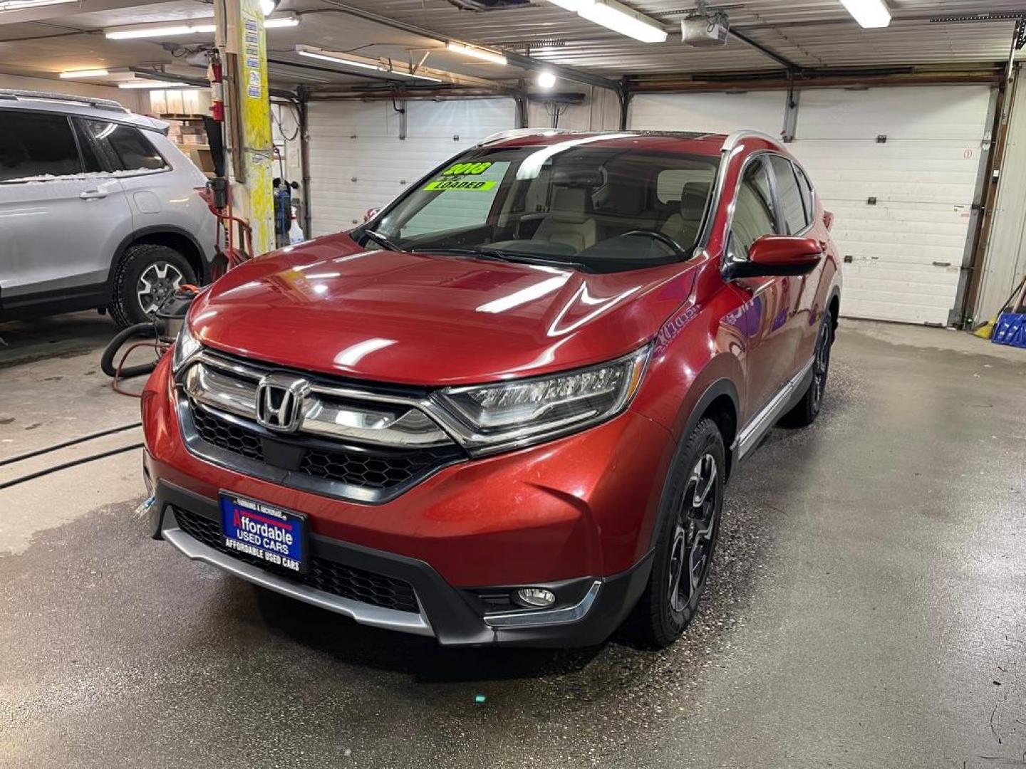 2018 ORANGE HONDA CR-V TOURING (5J6RW1H95JL) with an 1.5L engine, Continuously Variable transmission, located at 2525 S. Cushman, Fairbanks, AK, 99701, (907) 452-5707, 64.824036, -147.712311 - Photo#1