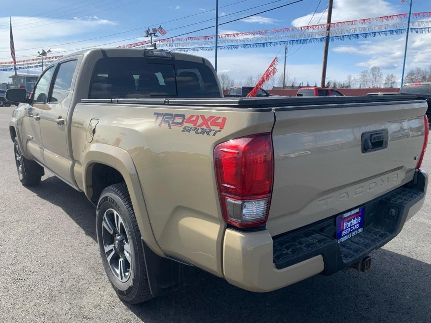 2017 TAN TOYOTA TACOMA DOUBLE CAB (3TMDZ5BN4HM) with an 3.5L engine, Automatic transmission, located at 2525 S. Cushman, Fairbanks, AK, 99701, (907) 452-5707, 64.824036, -147.712311 - Photo#2