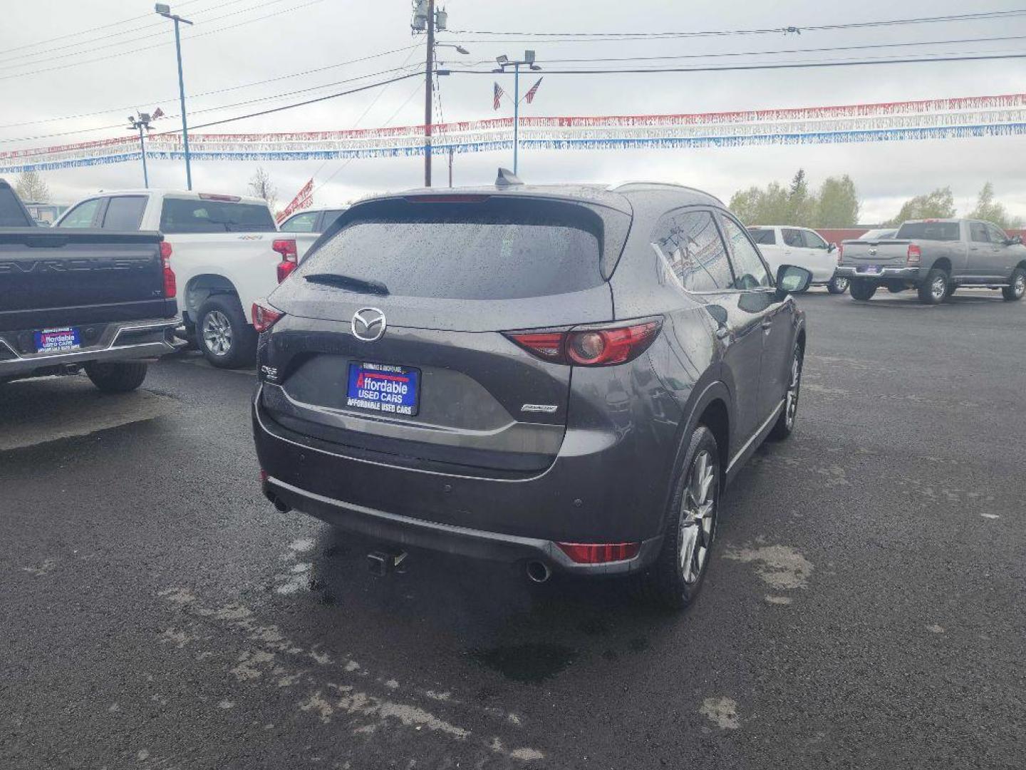 2019 GRAY MAZDA CX-5 SIGNATURE (JM3KFBEY6K0) with an 2.5L engine, Automatic transmission, located at 2525 S. Cushman, Fairbanks, AK, 99701, (907) 452-5707, 64.824036, -147.712311 - Photo#2