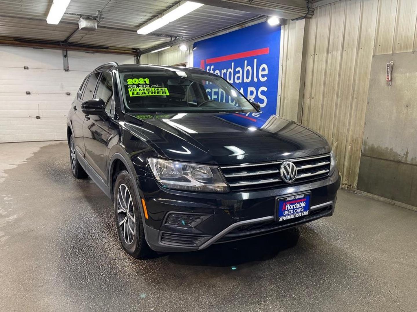 2021 BLACK VOLKSWAGEN TIGUAN SE (3VV2B7AX0MM) with an 2.0L engine, Automatic transmission, located at 2525 S. Cushman, Fairbanks, AK, 99701, (907) 452-5707, 64.824036, -147.712311 - Photo#0