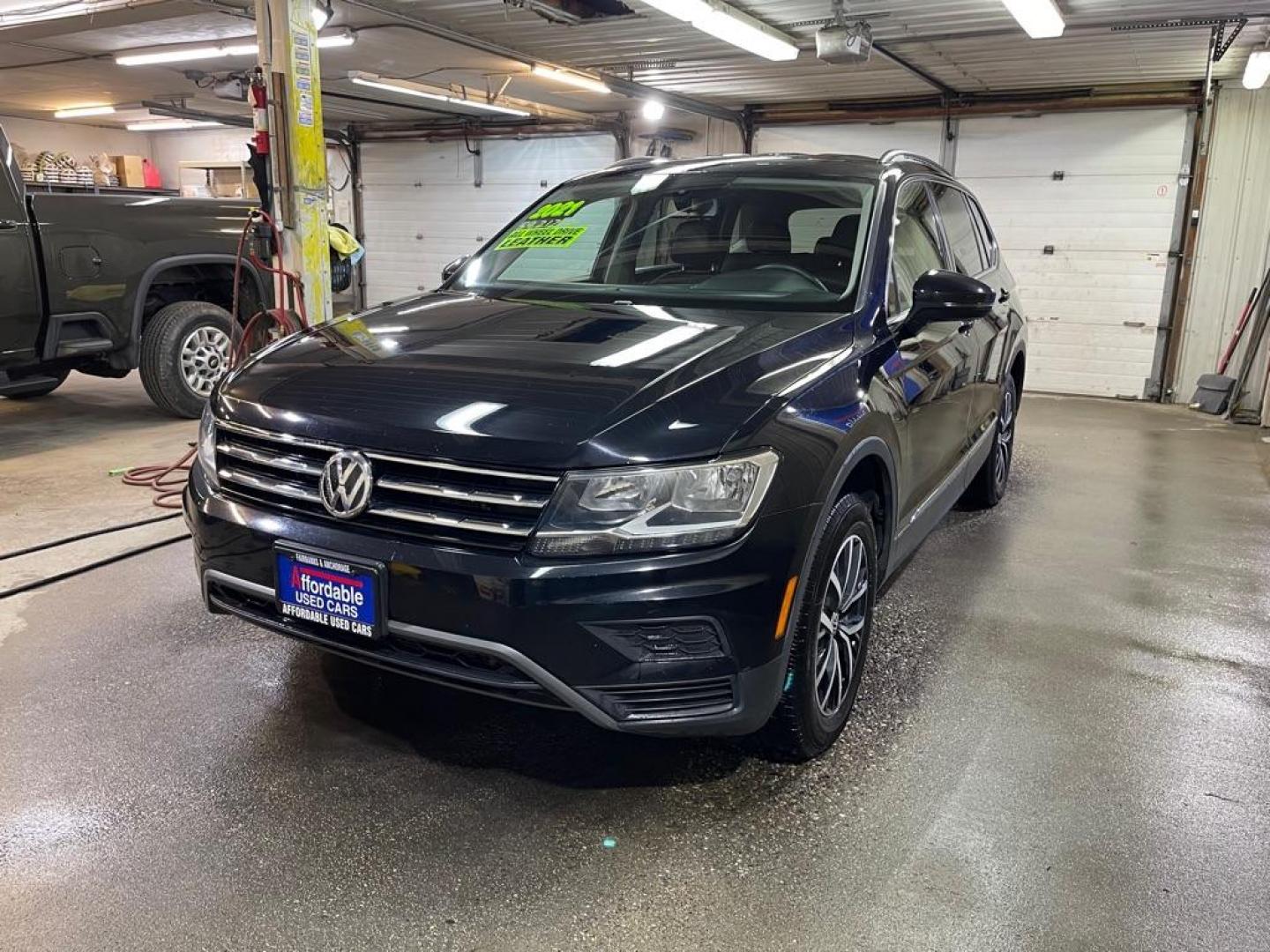 2021 BLACK VOLKSWAGEN TIGUAN SE (3VV2B7AX0MM) with an 2.0L engine, Automatic transmission, located at 2525 S. Cushman, Fairbanks, AK, 99701, (907) 452-5707, 64.824036, -147.712311 - Photo#1