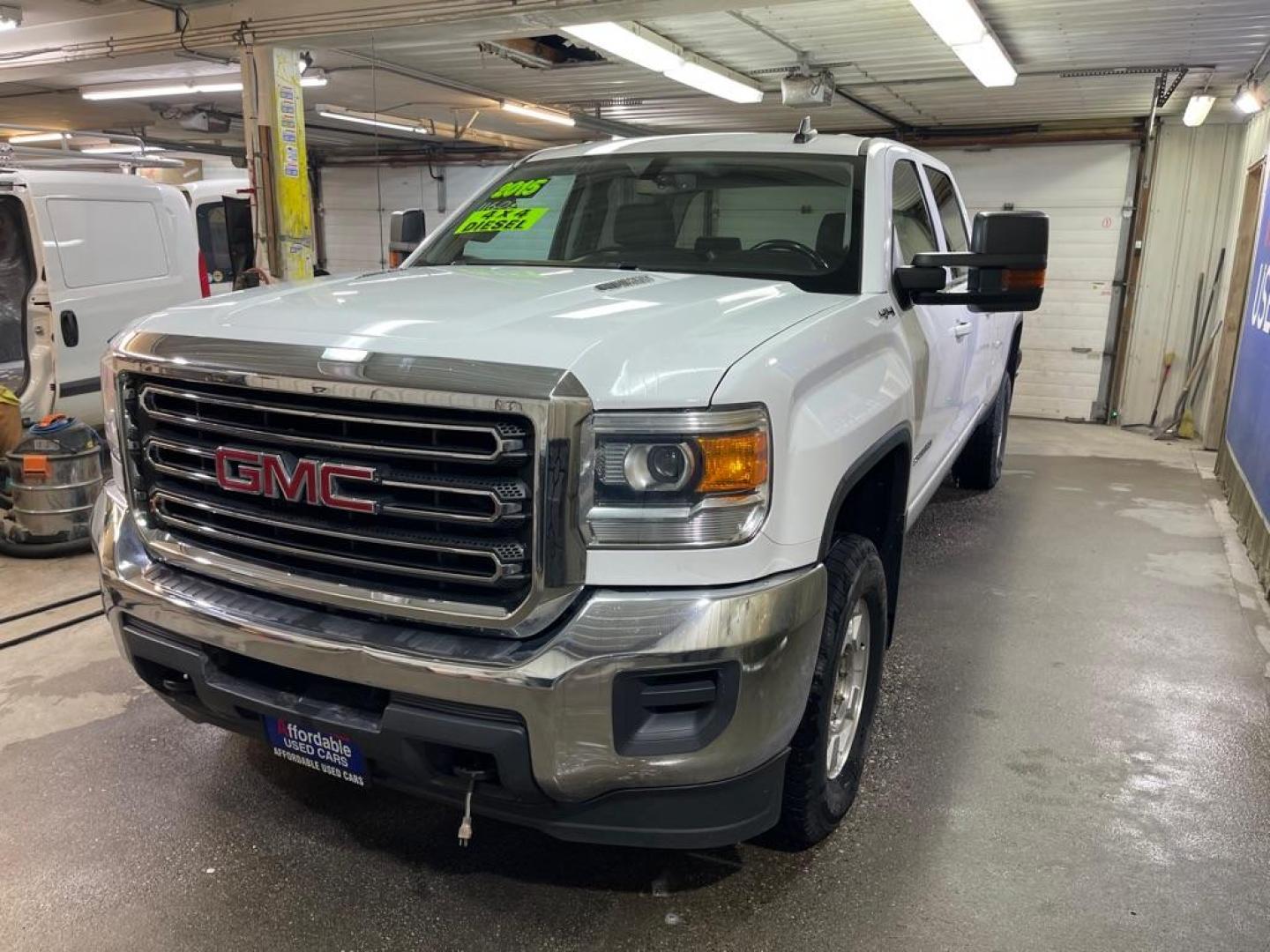 2015 WHITE GMC SIERRA 2500 SLE (1GT12YE88FF) with an 6.6L engine, Automatic transmission, located at 2525 S. Cushman, Fairbanks, AK, 99701, (907) 452-5707, 64.824036, -147.712311 - Photo#1