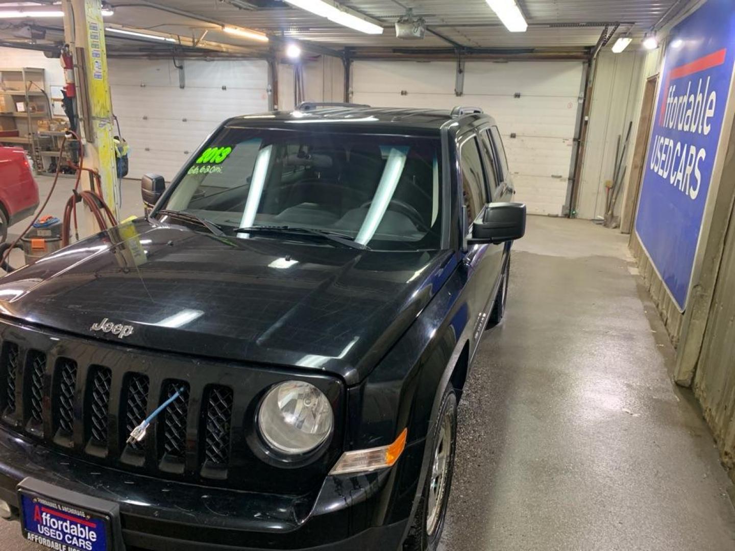 2013 BLACK JEEP PATRIOT SPORT (1C4NJRBB2DD) with an 2.4L engine, Continuously Variable transmission, located at 2525 S. Cushman, Fairbanks, AK, 99701, (907) 452-5707, 64.824036, -147.712311 - Photo#1