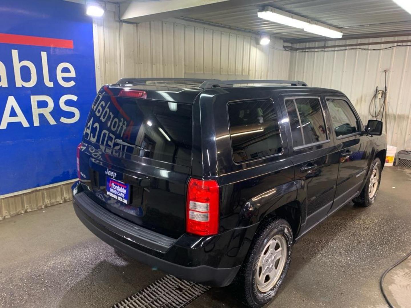 2013 BLACK JEEP PATRIOT SPORT (1C4NJRBB2DD) with an 2.4L engine, Continuously Variable transmission, located at 2525 S. Cushman, Fairbanks, AK, 99701, (907) 452-5707, 64.824036, -147.712311 - Photo#3