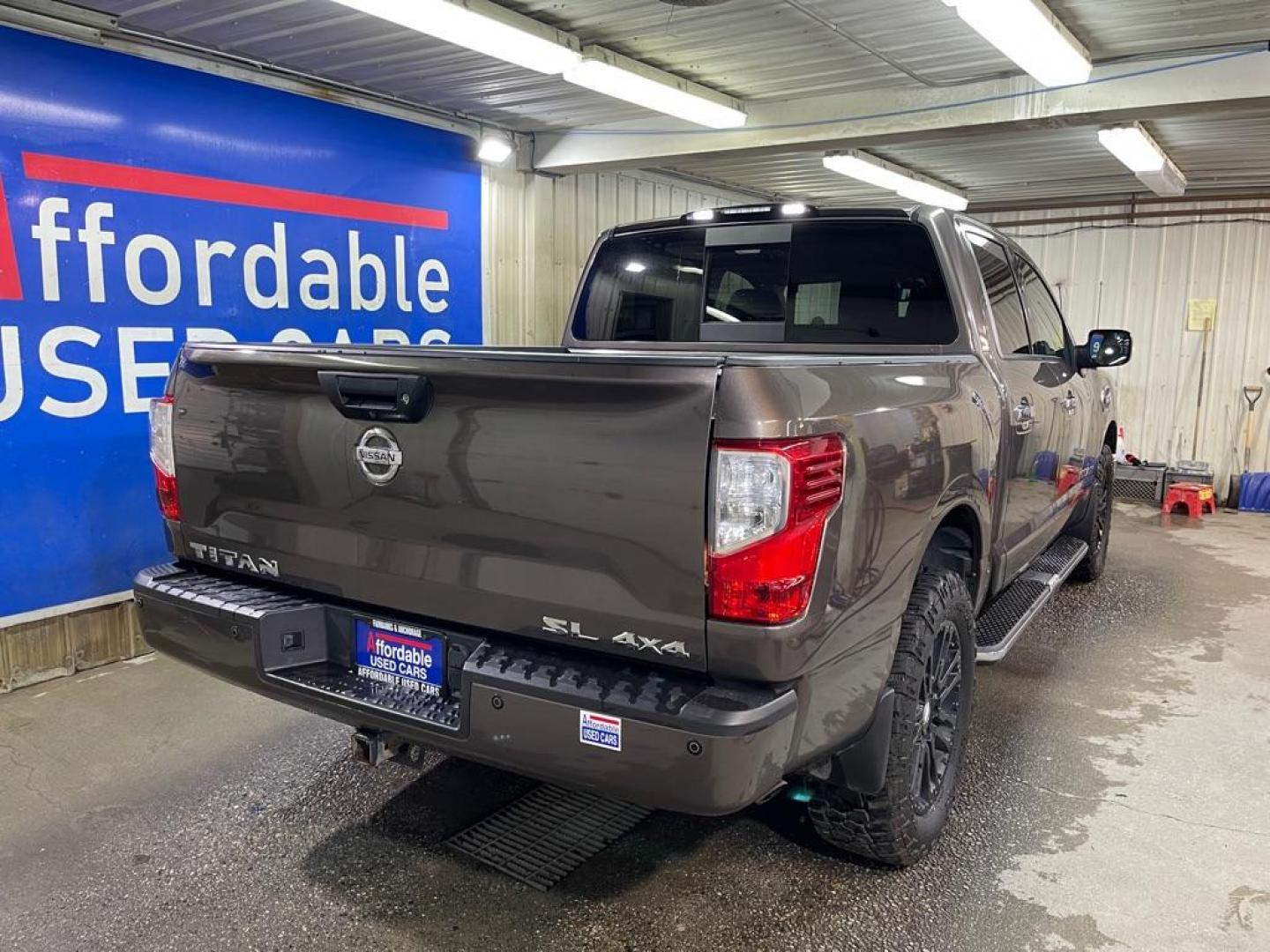 2017 GRAY NISSAN TITAN SV (1N6AA1E53HN) with an 5.6L engine, Automatic transmission, located at 2525 S. Cushman, Fairbanks, AK, 99701, (907) 452-5707, 64.824036, -147.712311 - Photo#2