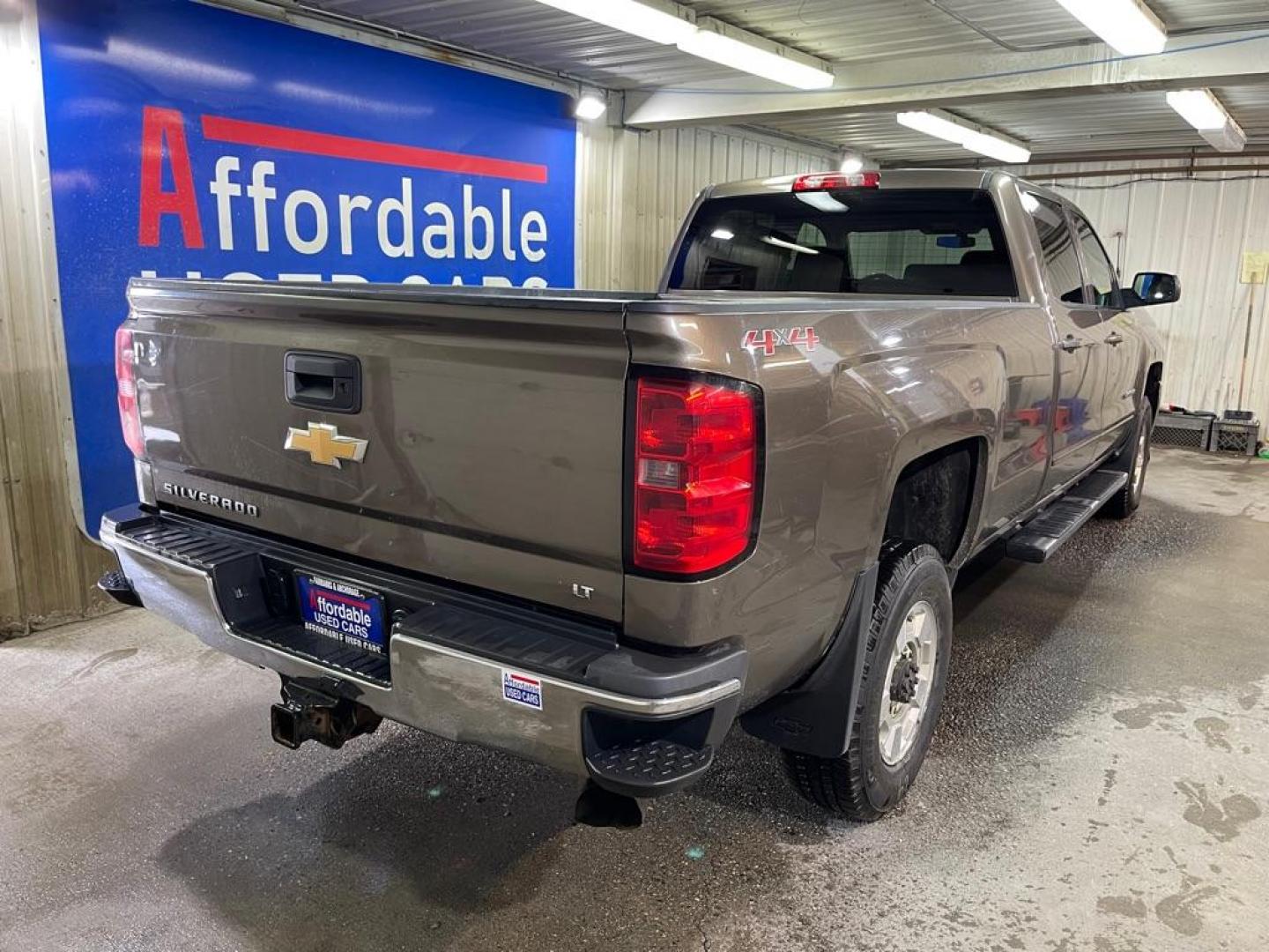 2015 BROWN CHEVROLET SILVERADO 2500 HEAVY DUTY LT (1GC1KVE81FF) with an 6.6L engine, Automatic transmission, located at 2525 S. Cushman, Fairbanks, AK, 99701, (907) 452-5707, 64.824036, -147.712311 - Photo#2