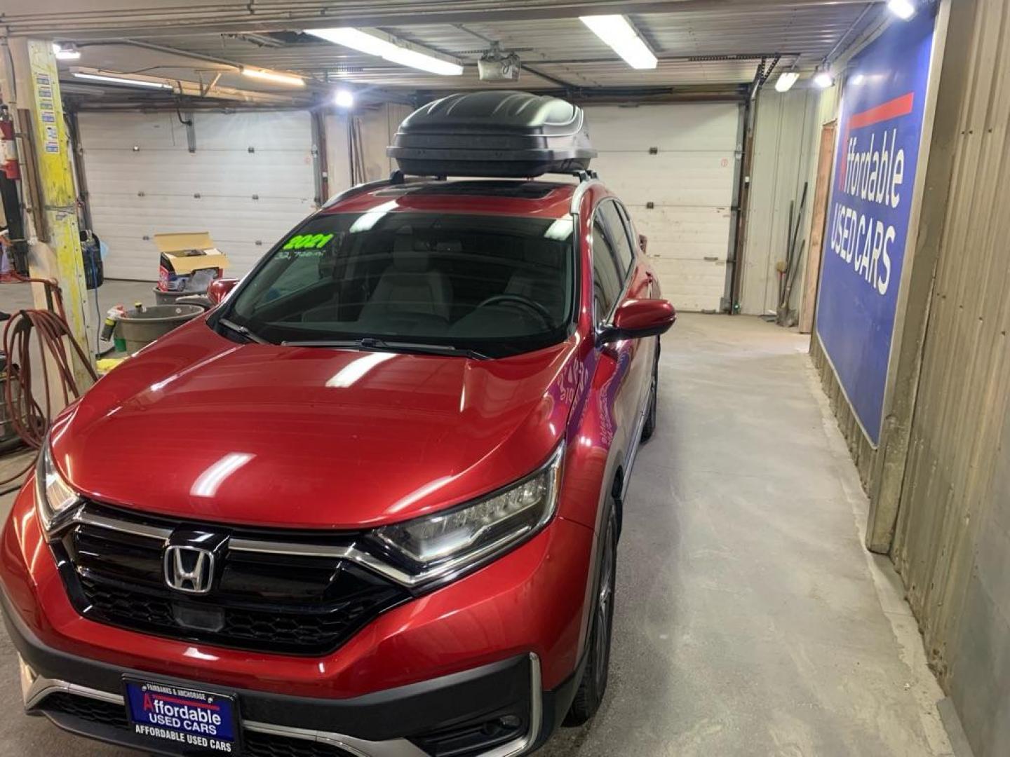 2021 RED HONDA CR-V TOURING (2HKRW2H97MH) with an 1.5L engine, Continuously Variable transmission, located at 2525 S. Cushman, Fairbanks, AK, 99701, (907) 452-5707, 64.824036, -147.712311 - Photo#1