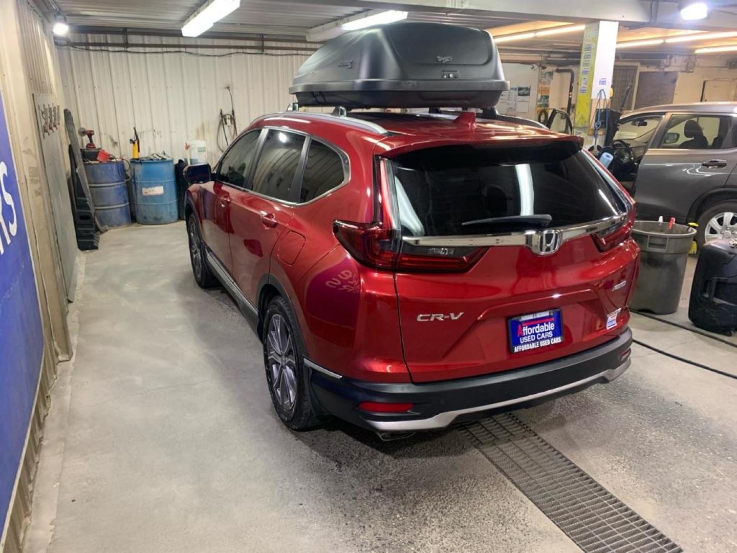 2021 RED HONDA CR-V TOURING (2HKRW2H97MH) with an 1.5L engine, Continuously Variable transmission, located at 2525 S. Cushman, Fairbanks, AK, 99701, (907) 452-5707, 64.824036, -147.712311 - Photo#2