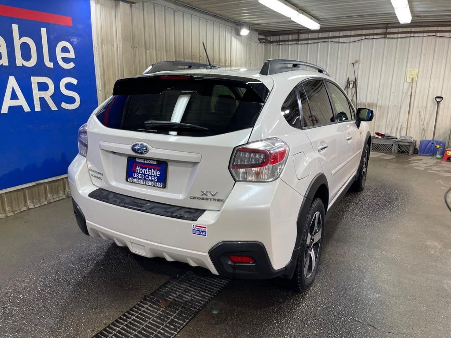 2015 WHITE SUBARU XV CROSSTREK 2.0I HYBRID TOU (JF2GPBPC6FH) with an 2.0L engine, Continuously Variable transmission, located at 2525 S. Cushman, Fairbanks, AK, 99701, (907) 452-5707, 64.824036, -147.712311 - Photo#2