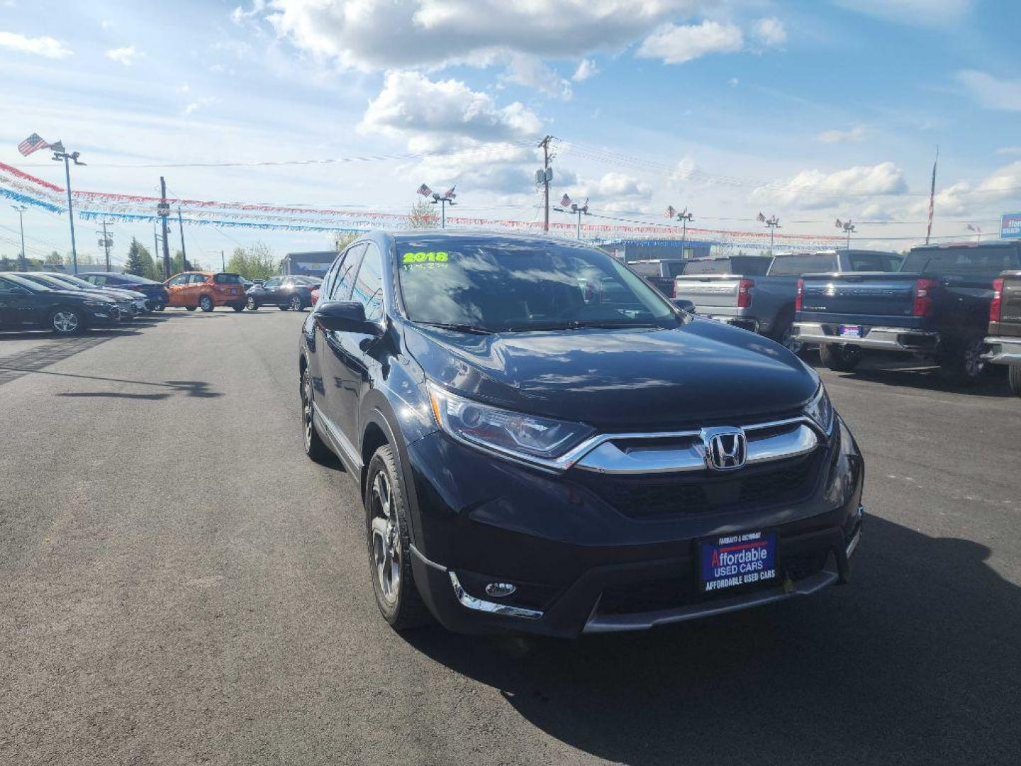 2018 BLACK HONDA CR-V EX (5J6RW1H5XJA) with an 1.5L engine, Continuously Variable transmission, located at 2525 S. Cushman, Fairbanks, AK, 99701, (907) 452-5707, 64.824036, -147.712311 - Photo#4