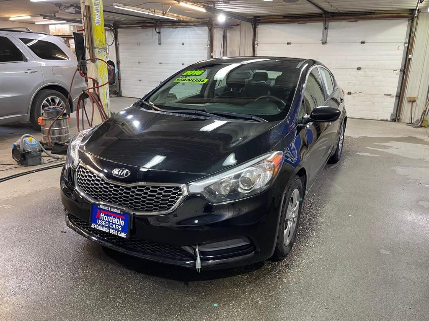 2016 BLACK KIA FORTE LX (KNAFK4A68G5) with an 1.8L engine, 6-Speed Manual transmission, located at 2525 S. Cushman, Fairbanks, AK, 99701, (907) 452-5707, 64.824036, -147.712311 - Photo#2