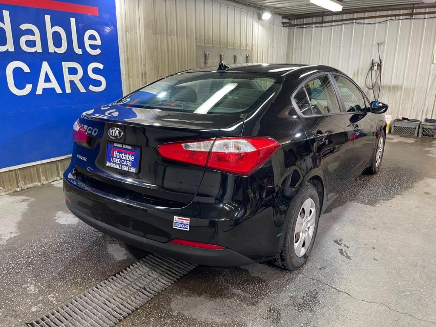 2016 BLACK KIA FORTE LX (KNAFK4A68G5) with an 1.8L engine, 6-Speed Manual transmission, located at 2525 S. Cushman, Fairbanks, AK, 99701, (907) 452-5707, 64.824036, -147.712311 - Photo#4