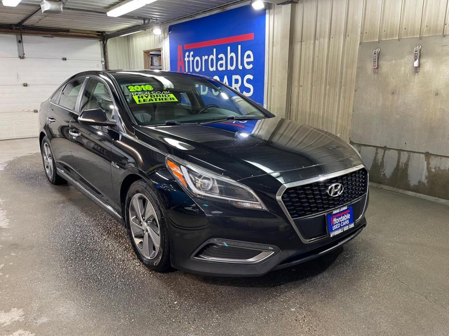 2016 BLACK HYUNDAI SONATA HYBRID (KMHE34L16GA) with an 2.0L engine, Automatic transmission, located at 2525 S. Cushman, Fairbanks, AK, 99701, (907) 452-5707, 64.824036, -147.712311 - Photo#0