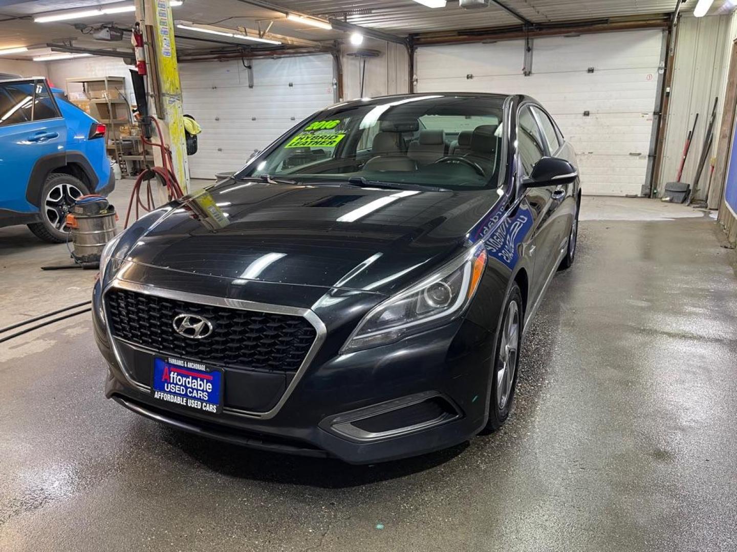 2016 BLACK HYUNDAI SONATA HYBRID (KMHE34L16GA) with an 2.0L engine, Automatic transmission, located at 2525 S. Cushman, Fairbanks, AK, 99701, (907) 452-5707, 64.824036, -147.712311 - Photo#1