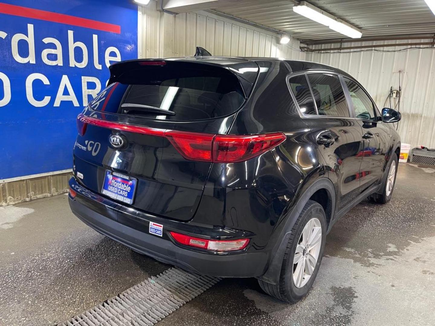2018 BLACK KIA SPORTAGE LX (KNDPMCAC9J7) with an 2.4L engine, Automatic transmission, located at 2525 S. Cushman, Fairbanks, AK, 99701, (907) 452-5707, 64.824036, -147.712311 - Photo#2