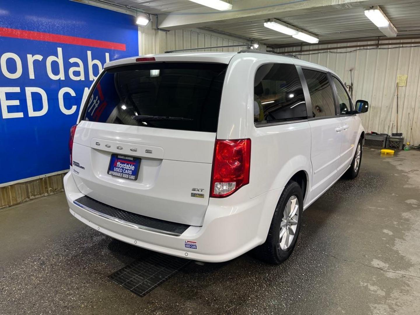 2014 WHITE DODGE GRAND CARAVAN SXT (2C4RDGCG1ER) with an 3.6L engine, Automatic transmission, located at 2525 S. Cushman, Fairbanks, AK, 99701, (907) 452-5707, 64.824036, -147.712311 - Photo#2