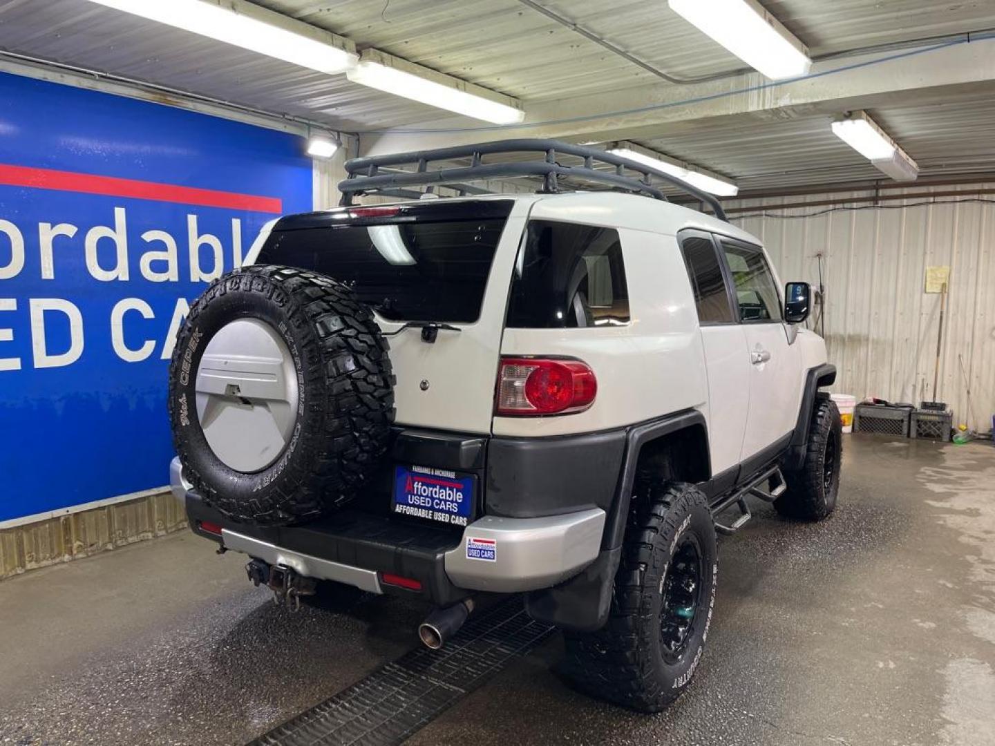 2011 WHITE TOYOTA FJ CRUISER (JTEBU4BF9BK) with an 4.0L engine, Automatic transmission, located at 2525 S. Cushman, Fairbanks, AK, 99701, (907) 452-5707, 64.824036, -147.712311 - Photo#2