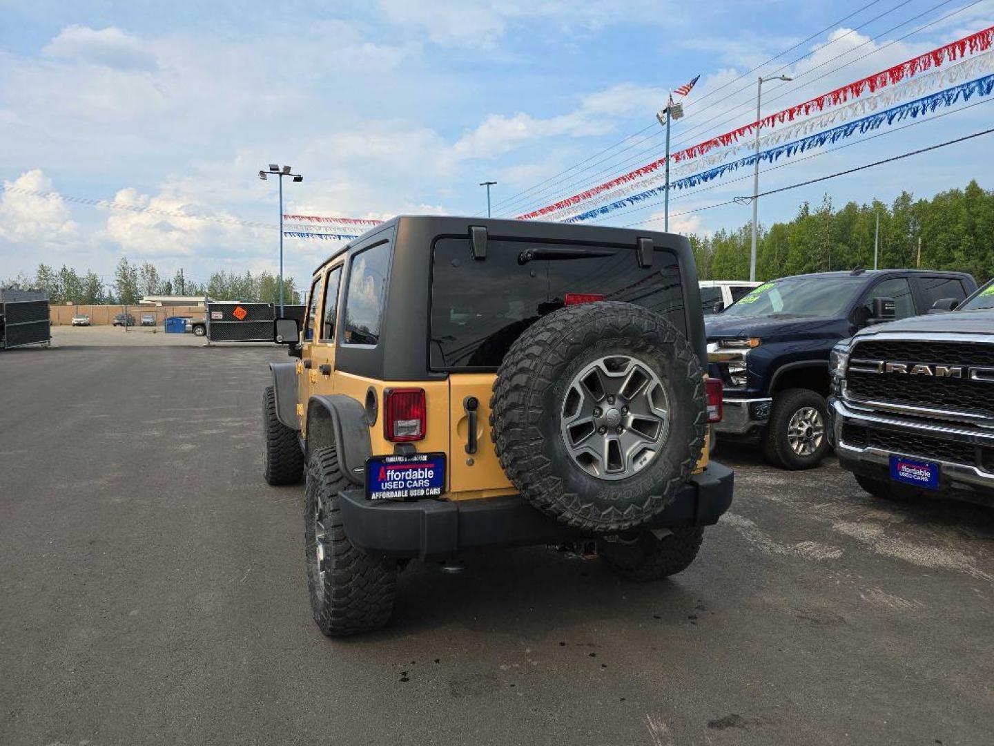 2013 SAND JEEP WRANGLER UNLIMI RUBICON (1C4BJWFG4DL) with an 3.6L engine, Automatic transmission, located at 2525 S. Cushman, Fairbanks, AK, 99701, (907) 452-5707, 64.824036, -147.712311 - Photo#2