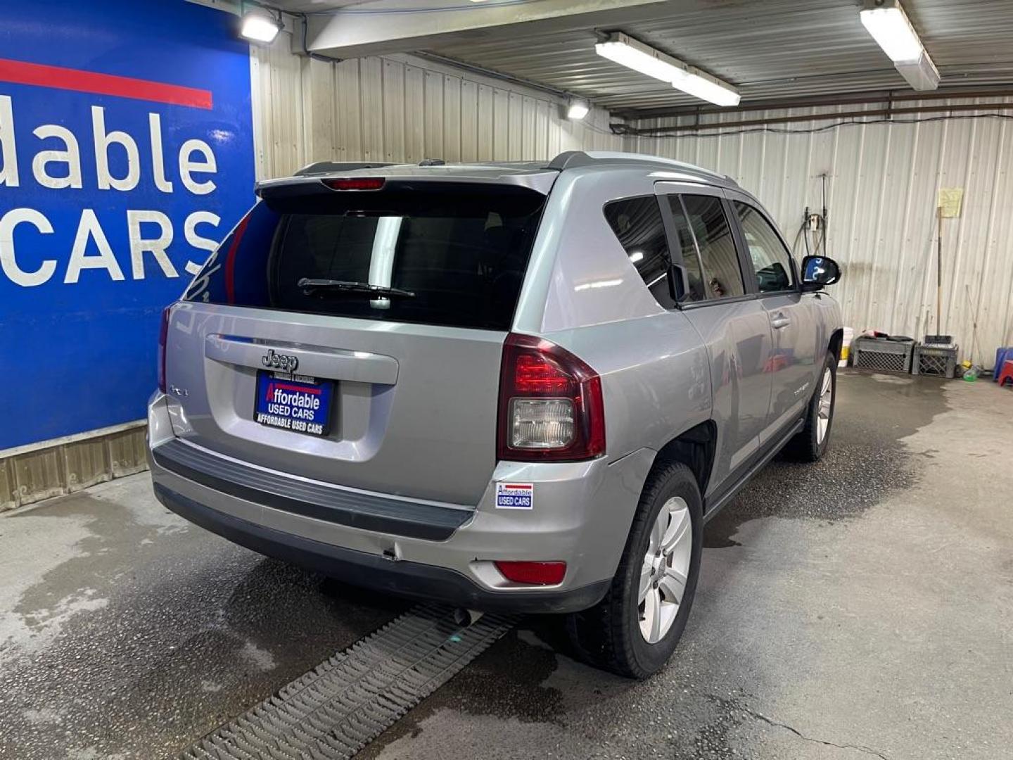 2016 SILVER JEEP COMPASS SPORT (1C4NJDBB8GD) with an 2.4L engine, Continuously Variable transmission, located at 2525 S. Cushman, Fairbanks, AK, 99701, (907) 452-5707, 64.824036, -147.712311 - Photo#2