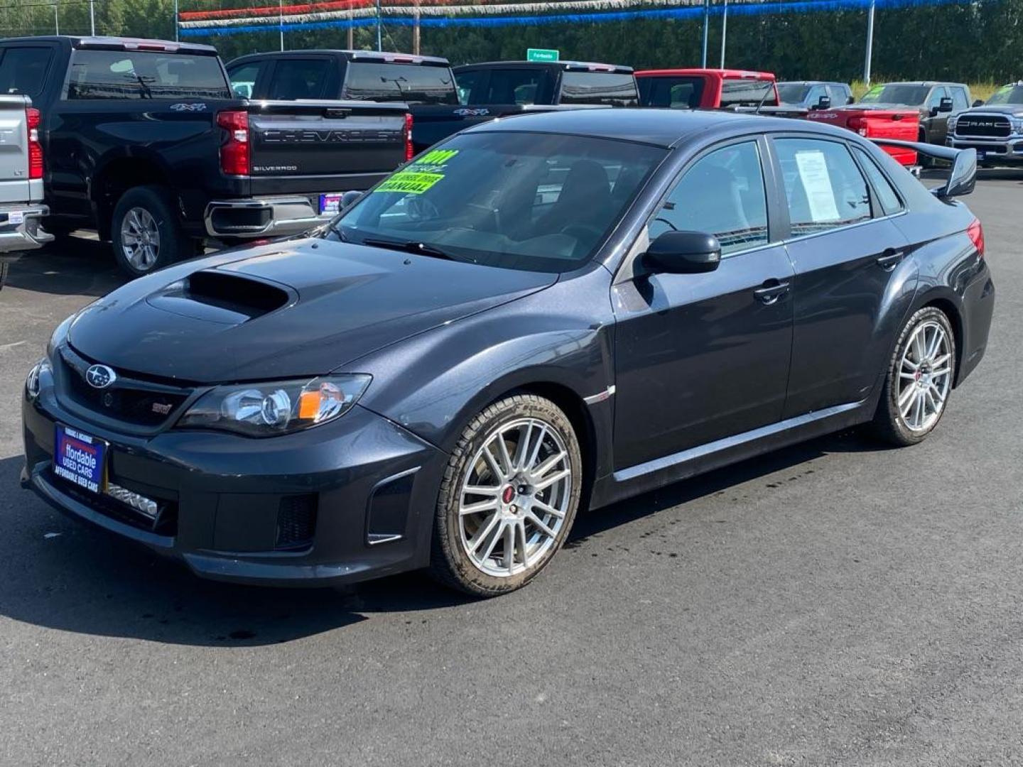 2011 BLACK SUBARU IMPREZA WRX STI (JF1GV8J61BL) with an 2.5L engine, Automatic transmission, located at 2525 S. Cushman, Fairbanks, AK, 99701, (907) 452-5707, 64.824036, -147.712311 - Photo#0