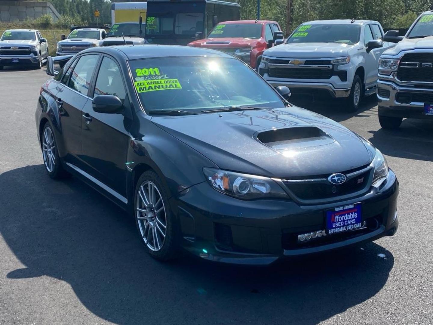 2011 BLACK SUBARU IMPREZA WRX STI (JF1GV8J61BL) with an 2.5L engine, Automatic transmission, located at 2525 S. Cushman, Fairbanks, AK, 99701, (907) 452-5707, 64.824036, -147.712311 - Photo#1