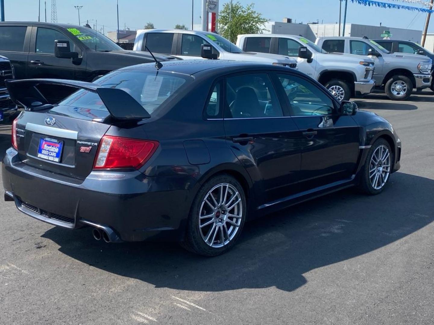 2011 BLACK SUBARU IMPREZA WRX STI (JF1GV8J61BL) with an 2.5L engine, Automatic transmission, located at 2525 S. Cushman, Fairbanks, AK, 99701, (907) 452-5707, 64.824036, -147.712311 - Photo#2